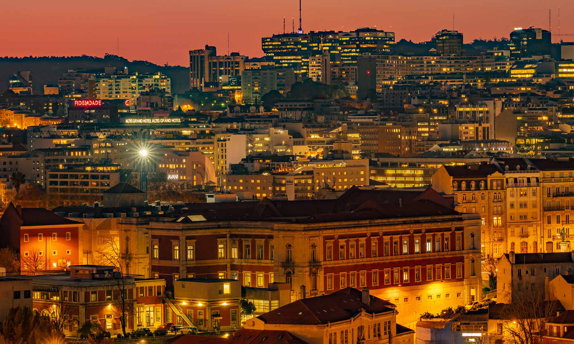 Closeup of several buildings in Lisbon, Portugal during dusk